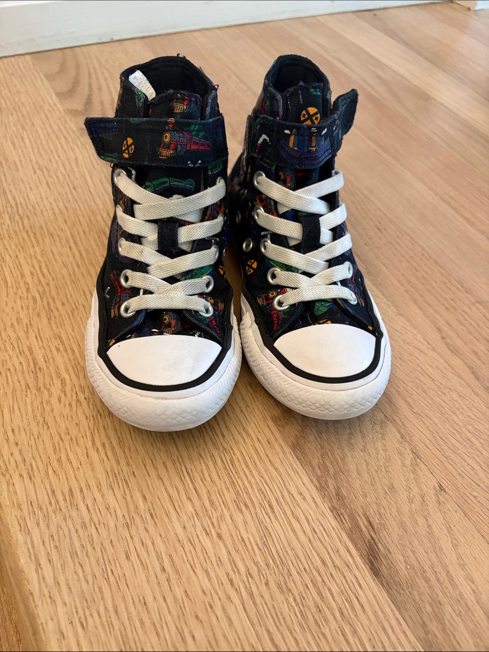 Kids Converse High-Top Sneakers in Black with Colorful Train Print